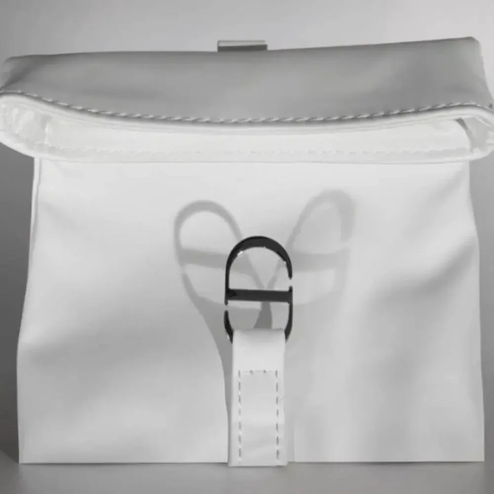 Dior white roll top cosmetic pouch